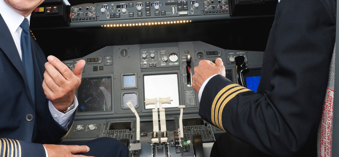 plaatje piloten in vliegtuig op de automatische piloot vliegen